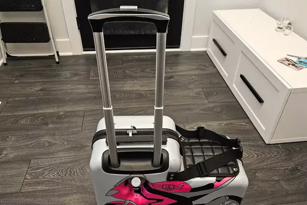 The Younglingz Ride On Suitcase with the handle fully extended