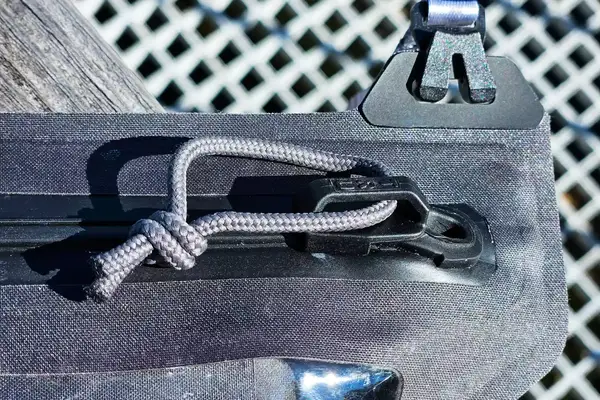 A close-up of the zipper of the Nite Ize RunOff Waterproof Phone Case