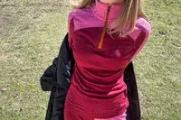 Person taking off jacket with Smartwool Classic Thermal Merino Base Layer 1/4 Zip underneath.