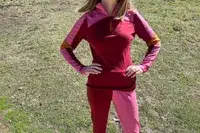 Person wearing Smartwool Classic Thermal Merino Base Layer 1/4 Zip.