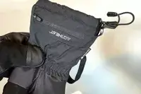 A person holds the Outdoor Research Prevail Heated GORE-TEX Gloves