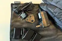 The chargers and adapter for the Outdoor Research Prevail Heated GORE-TEX Gloves