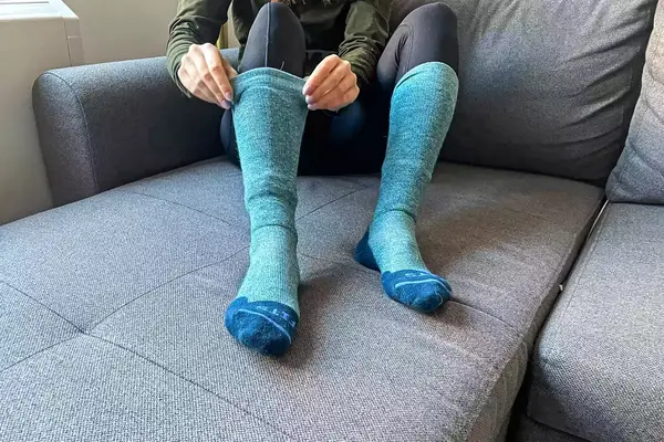 A person wearing the Fits Light Ski Sock