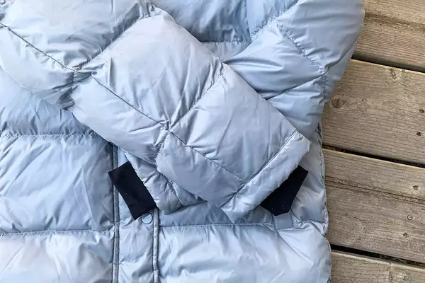 The sleeves on the Quince Responsible Down Long Puffer Jacket