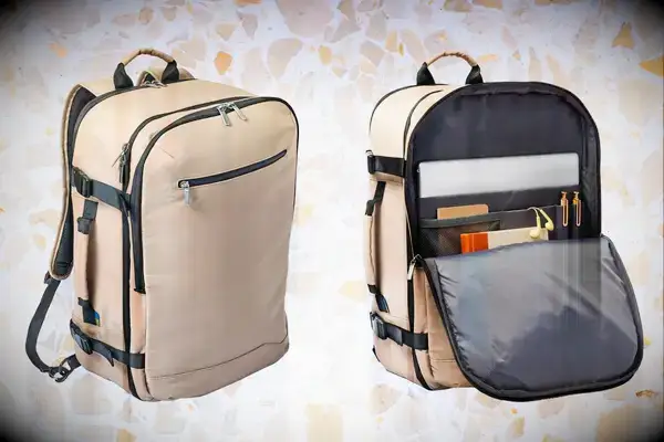Open Story 35L Travel Backpack on a colorful stone background