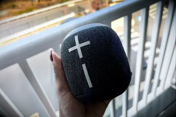 A person holds up the Ultimate Ears Wonderboom 3