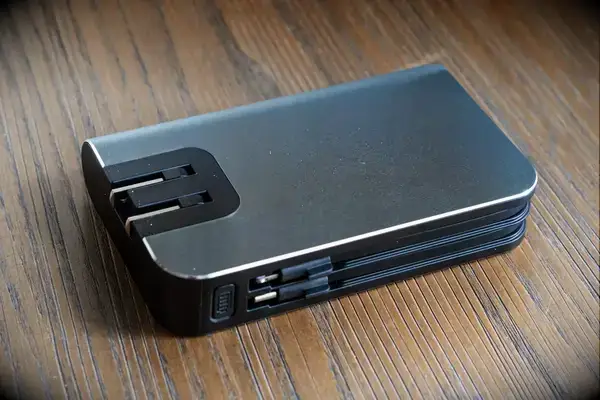 the back of the myCharge Fast Charging Portable Charger facing up on a wooden surface