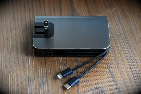 The myCharge Fast Charging Portable Charger on a wooden surface