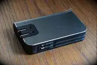 the back of the myCharge Fast Charging Portable Charger facing up on a wooden surface