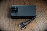 The myCharge Fast Charging Portable Charger on a wooden surface