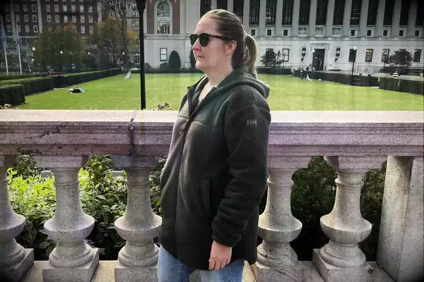 Person wearing a Helly Hansen Womenâs Maud Fleece Jacket Zip Jacket outside