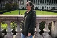 Person wearing a Helly Hansen Womenâs Maud Fleece Jacket Zip Jacket outside