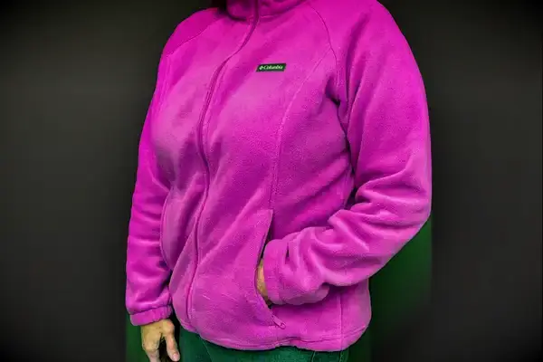 Person with their hand in the pocket of a Columbia Women