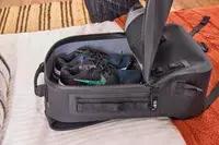 Shoes are placed inside the Yeti Panga 28L Waterproof Backpack