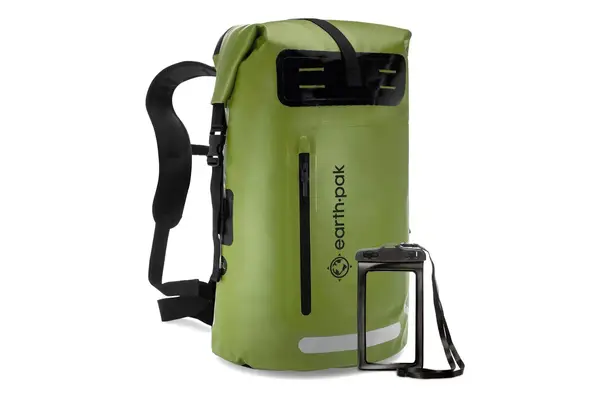 Hand holding an tablet inside of an inner pocket in the Kühl Eskape 25 Backpack