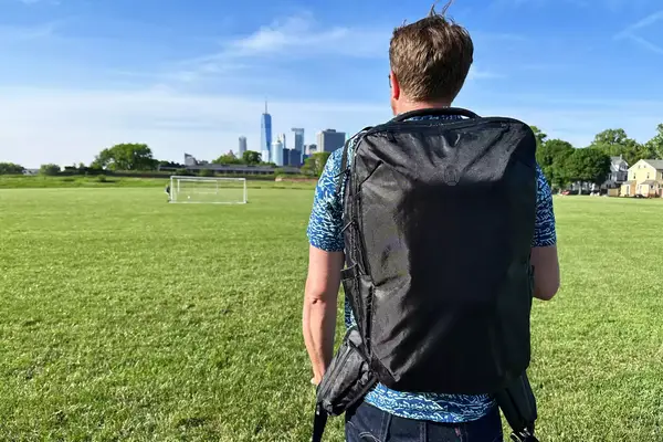 Person wearing the Tortuga Travel Backpack 40L outside