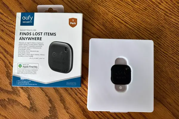 The Eufy SmartTrack Link in its original packaging next to the box