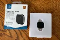 The Eufy SmartTrack Link in its original packaging next to the box