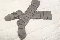 Comrad Knee High Compression Socks On Bedspread