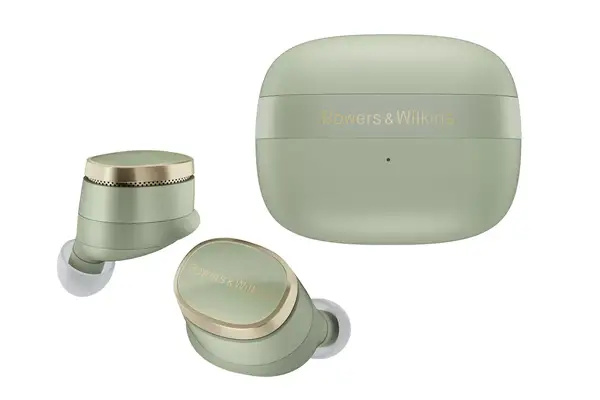 A person unpacking the Ostrich Pillow Go Neck Pillow on an airplane seat