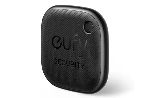 A person grabbing the Ostrich Pillow Go Neck Pillow from their bag