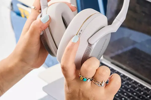 Two hands holding the Bowers & Wilkins Px7 S2e 