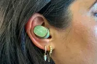 Bowers & Wilkins Pi8 Headphones in someone