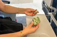 Bowers & Wilkins Pi8 Headphones being taking out