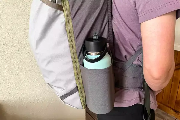View of the side water bottle pocket on a Cotopaxi Allpa 42L Travel Pack