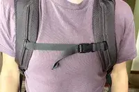 Close-up of a person wearing a Cotopaxi Allpa 42L Travel Pack