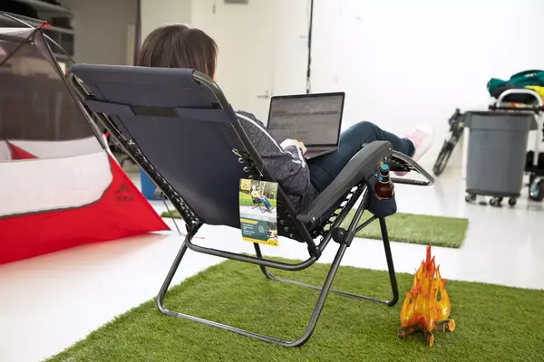 The Kuiu Mountain Star 2 Person Tent with cover on grass