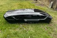 Thule Motion 3 laying on a grassy lawn