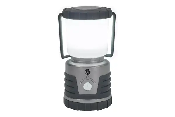 A person pours ground coffee into the nCamp CafÃ© Portable Coffee Maker