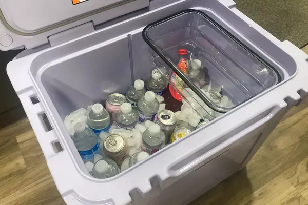 Yeti Roadie 60 Wheeled Cooler filled with ice and drinks
