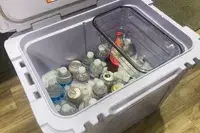 Yeti Roadie 60 Wheeled Cooler filled with ice and drinks