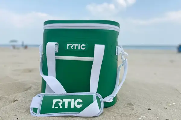 The RTIC Insulated Soft Cooler Bag sitting on the beach