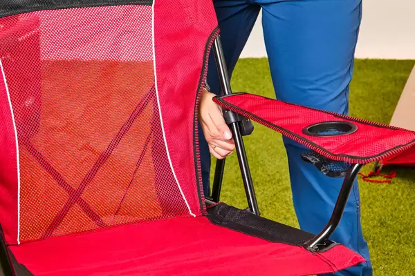 Someone sets up the Kijaro Dual Lock Camping Chair