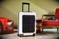 A July Carry On Pro SnapSleeve in a living room setting