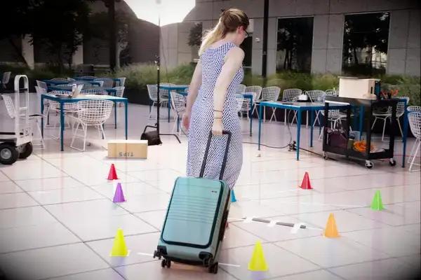 A laptop inside the front pocket of the Carl Friedrik The Carry-on