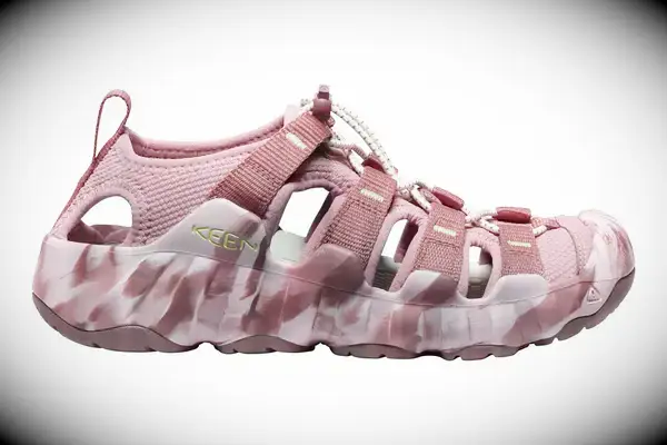 Top view of a person wearing the Bared Footwear Sanderlings on the sand