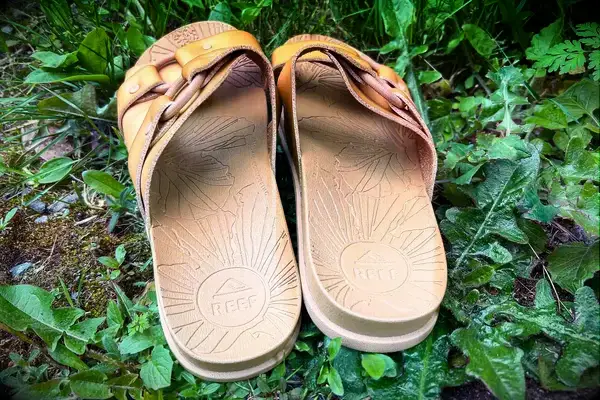 Reef Cushion Vera Cruz Slide in the grass