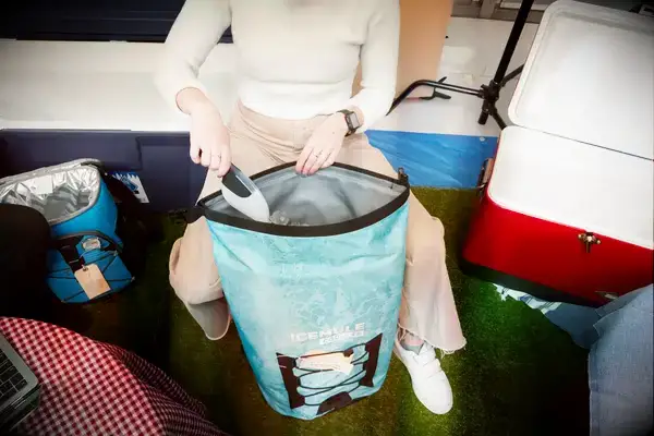 A Yeti Hopper Flip 12 Soft Cooler sitting on the beach