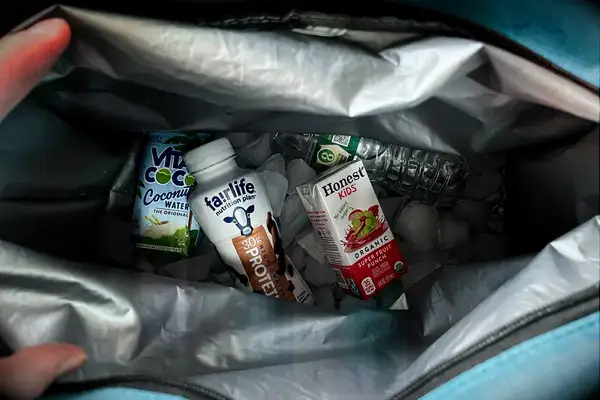 Drinks and ice inside the Igloo Latitude Snapdown 36-Can Cooler Bag