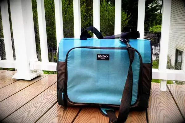 The Igloo Latitude Snapdown 36-Can Cooler Bag on a porch