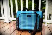 The Igloo Latitude Snapdown 36-Can Cooler Bag on a porch
