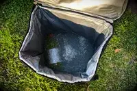 dbest Products Ultra Compact Cooler filled with ice and drinks