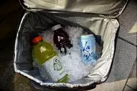 dbest Products Ultra Compact Cooler filled with ice and drinks