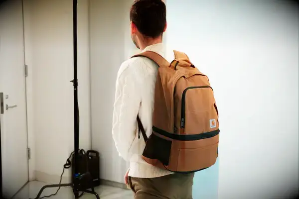 Overhead view of the Hydro Flask 26 L Day Escape Soft Cooler Tote in the grass