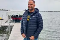 A person wears the Stio Men