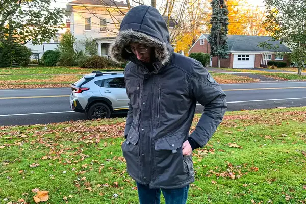 A person with the hands in the pockets of the Kuhl Men